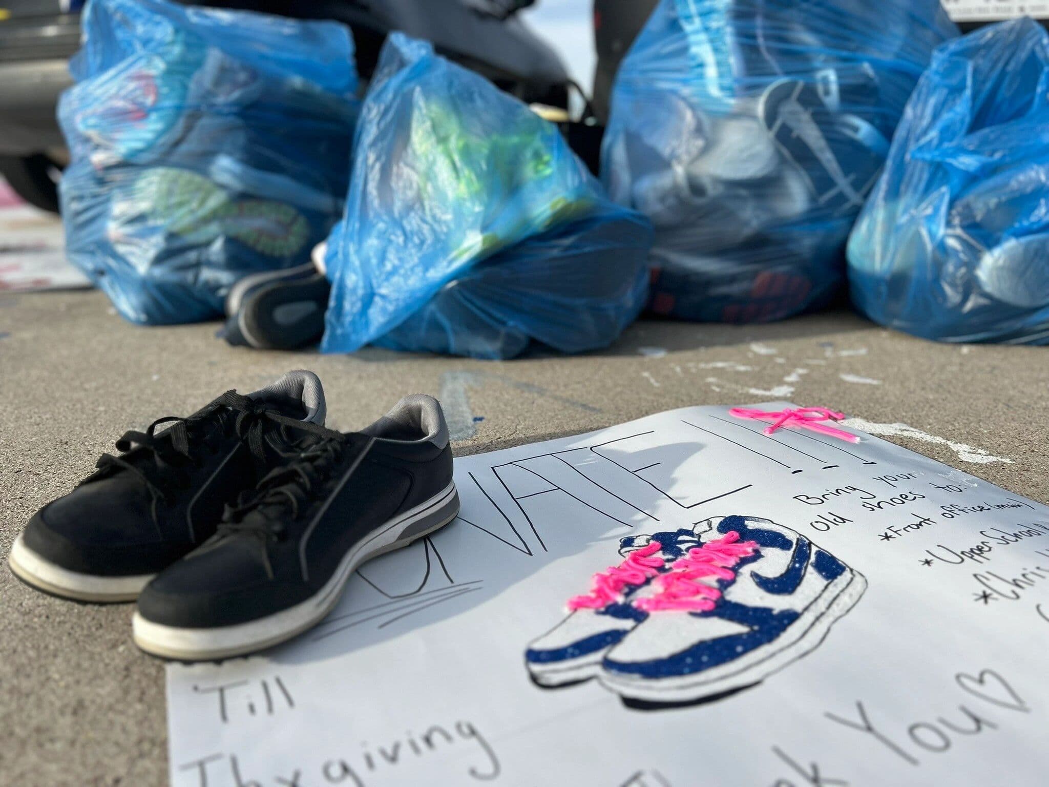 Bags of shoes collected at a shoe drive